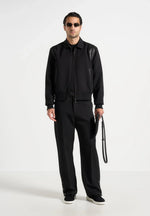 relaxed-fit-tailored-button-cuff-trousers-black