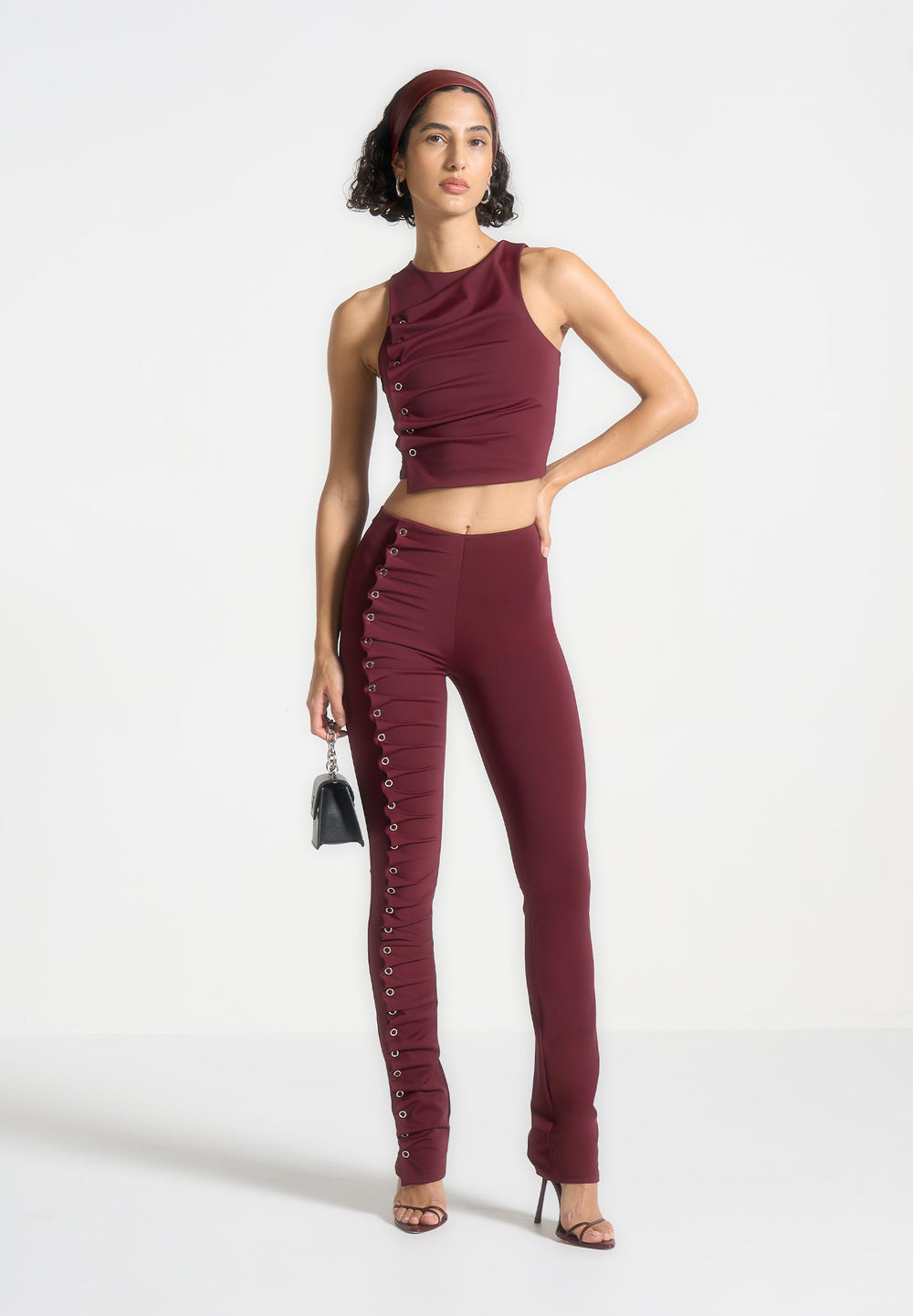 eyelet-detail-tacked-leggings-wine-red