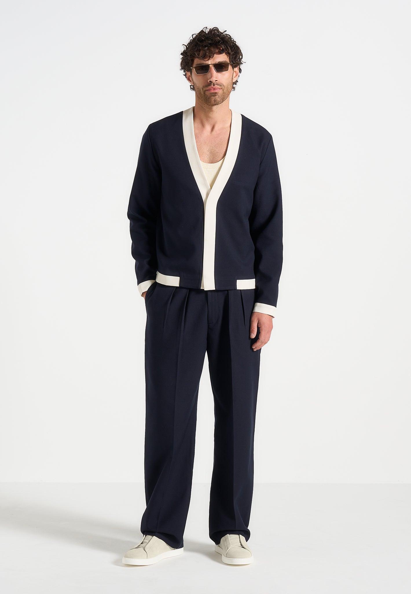 pierre-relaxed-fit-pleated-tailored-trousers-navy-1