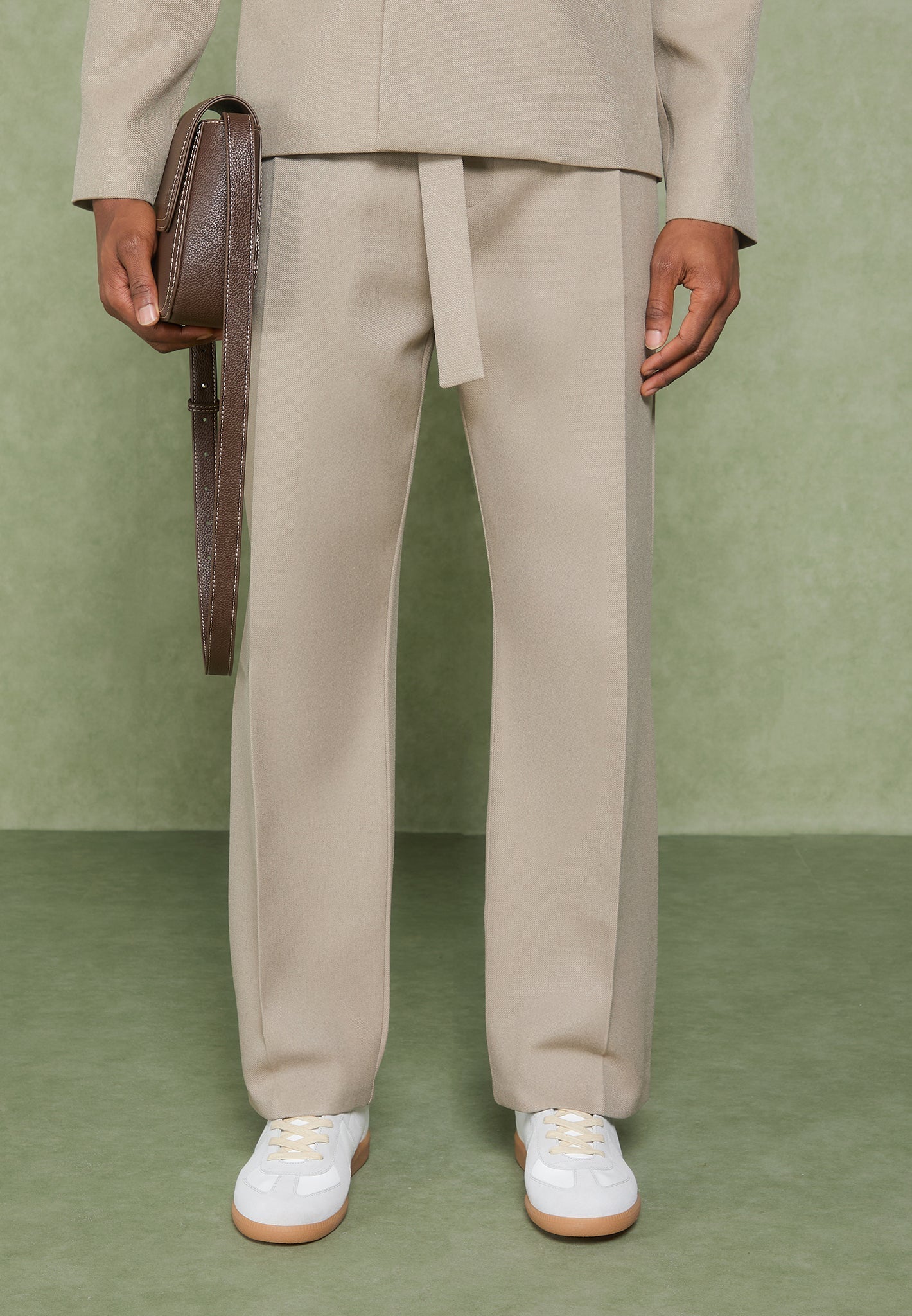 relaxed-fit-textured-belted-tailored-trousers-beige