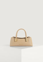 Annelise - Pebbled Leather Baguette Bag - Beige