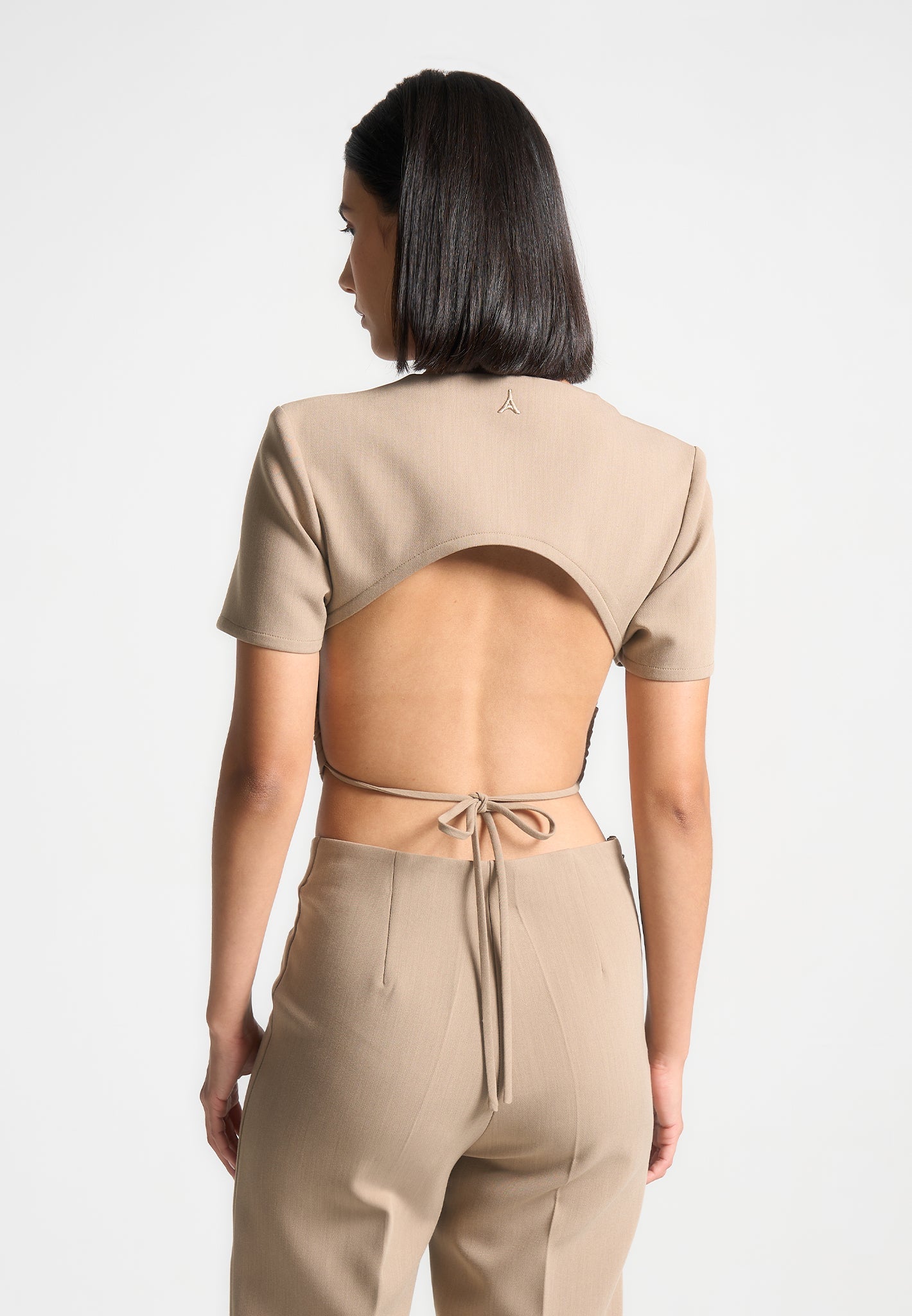 curved-hem-backless-top-with-tie-dark-beige