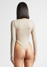 eternelle-high-leg-long-sleeve-bodysuit-beige