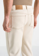 dn001-tapered-fit-jeans-cream