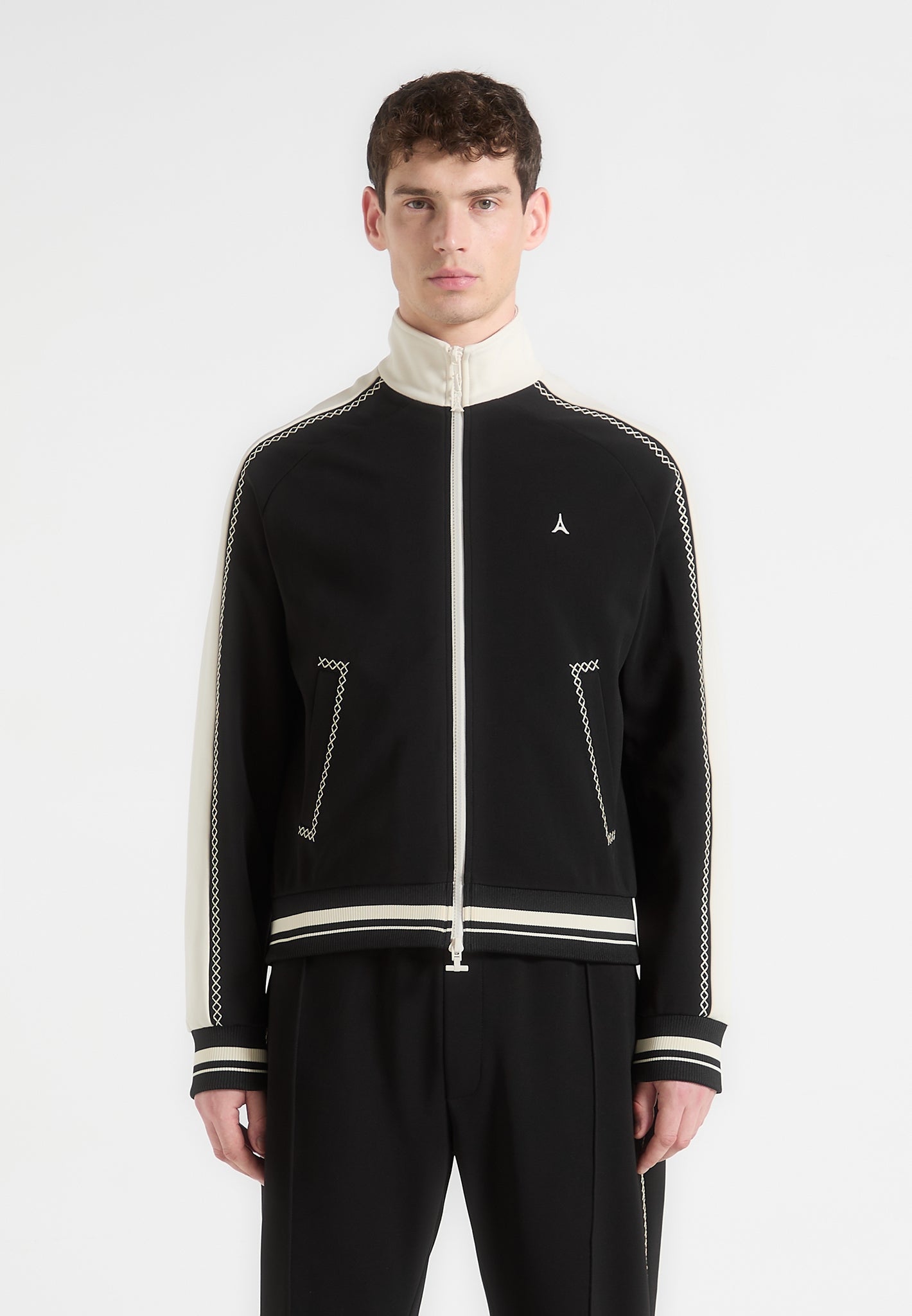tristan-contrast-whipstitch-raglan-track-jacket-black 