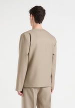 collarless-double-breasted-minimal-blazer-beige