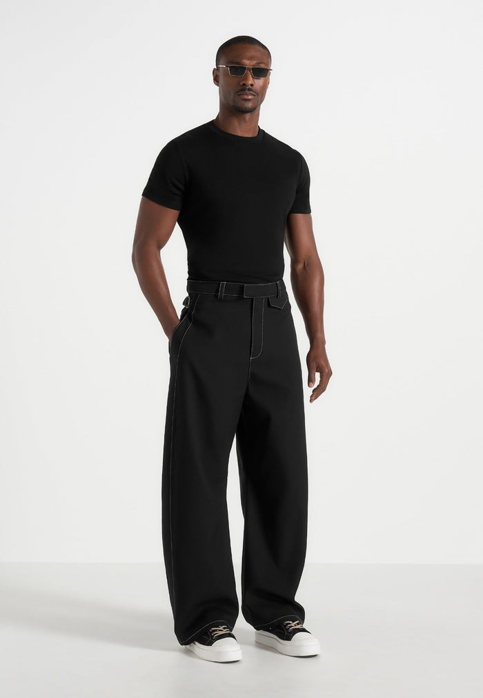 marceau-contrast-stitch-barrel-leg-trousers-black