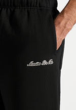 js003-unisex-signature-wide-leg-joggers-black