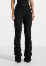 caroline-tacked-suede-flared-trousers-black