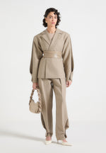 twist-leg-tailored-trousers-taupe