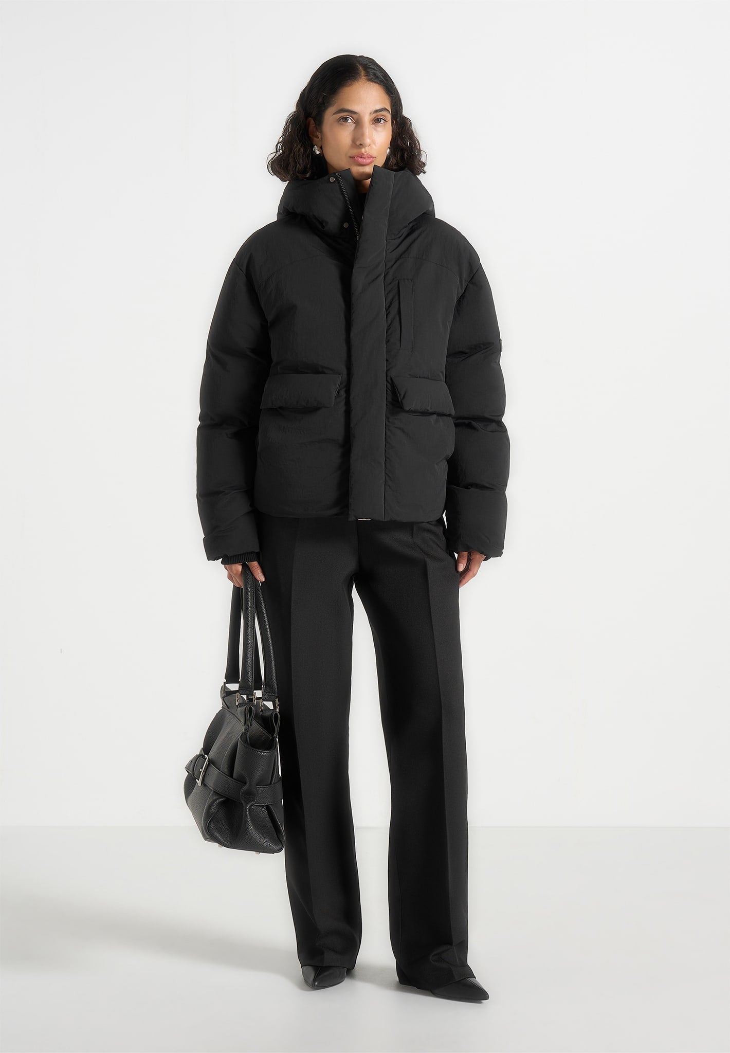 casey-unisex-minimal-raglan-puffer-jacket-black