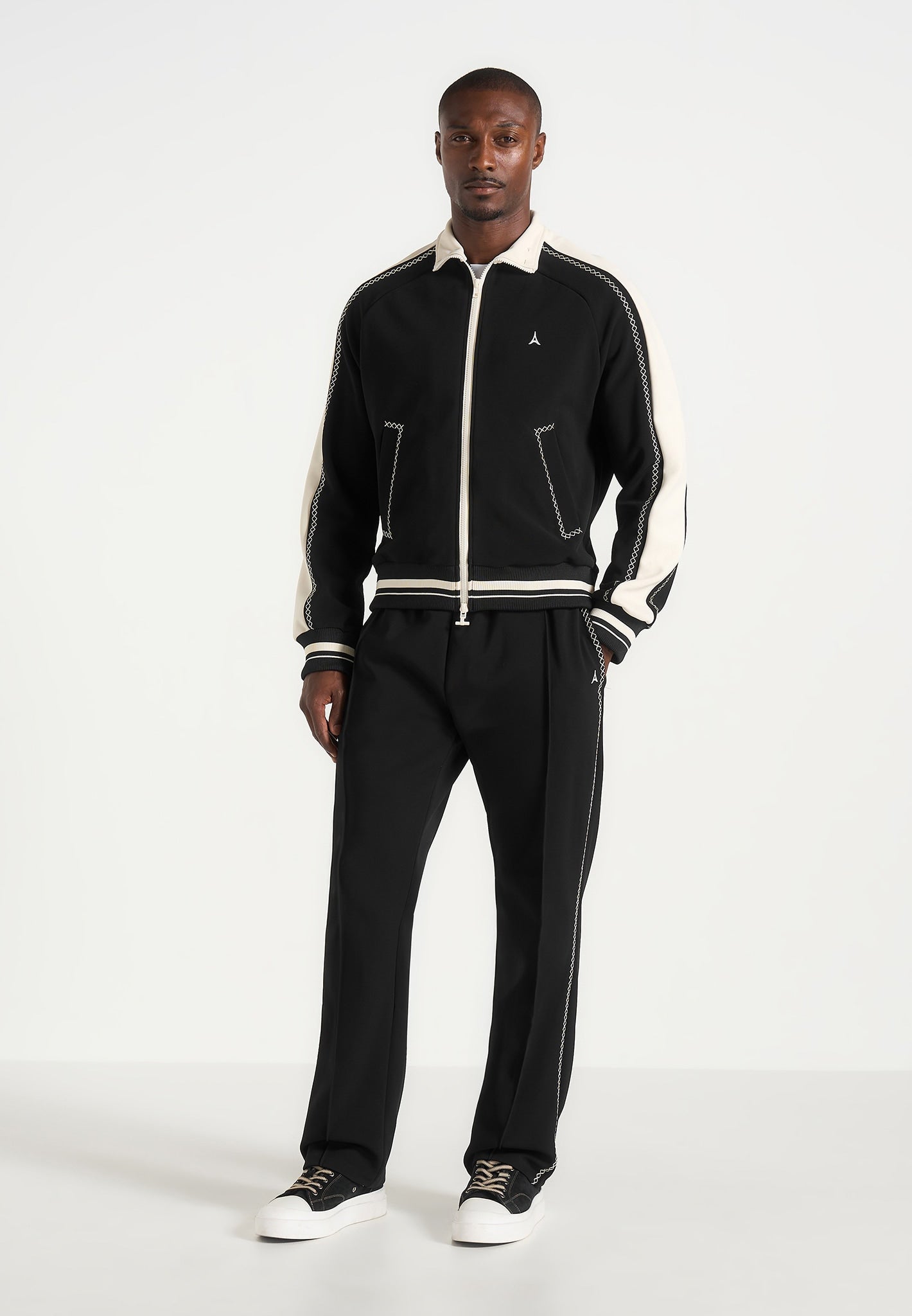 gael-contrast-whipstitch-relaxed-track-pants-black