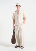 wide-leg-textured-trousers-with-belt-cream