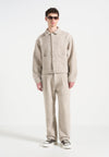arnault-boucle-pleated-jeans-beige