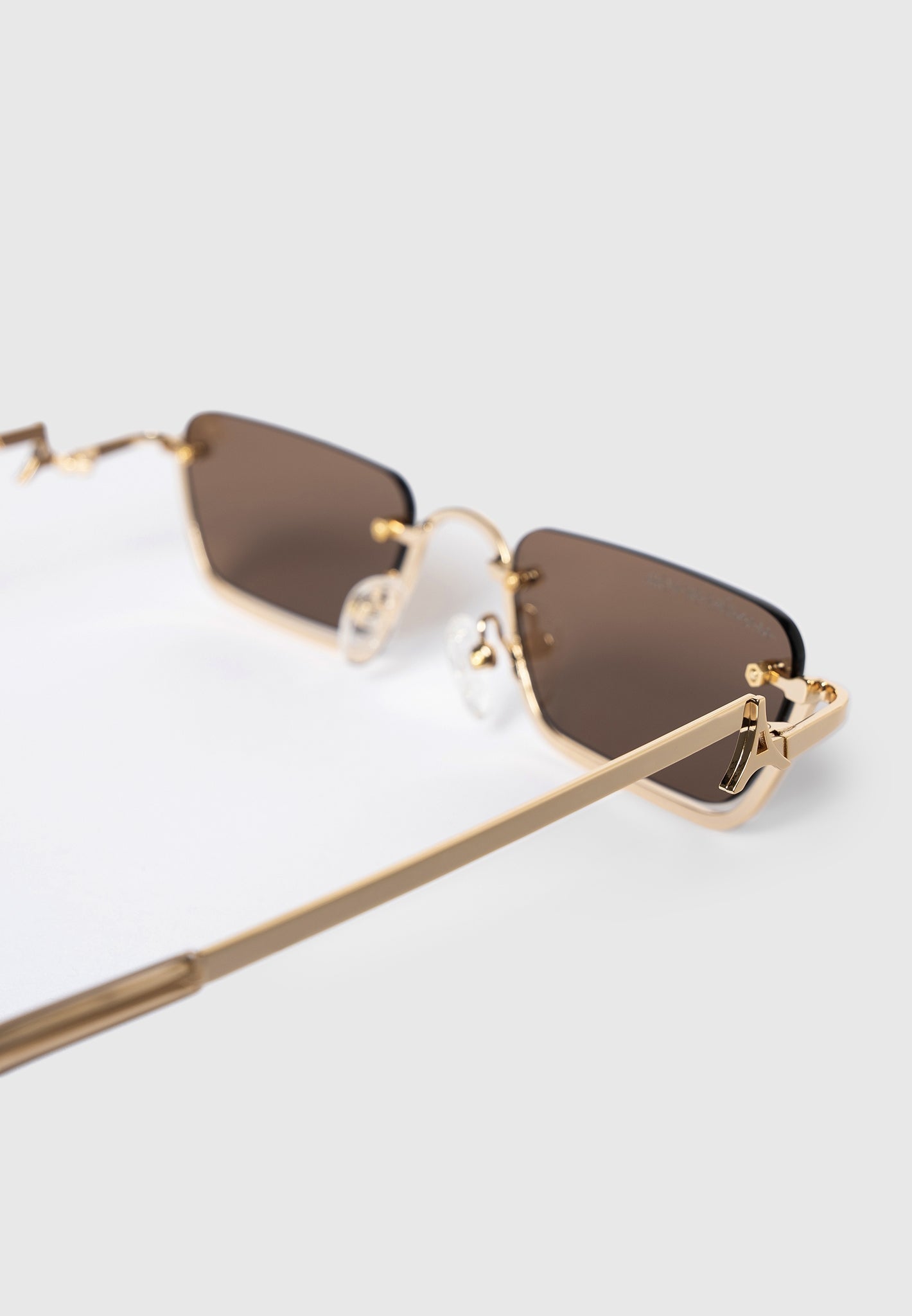 kai-rectangular-frameless-sunglasses-gold