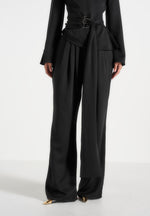 aurore-mock-neck-ring-belt-pleated-leg-jumpsuit-black