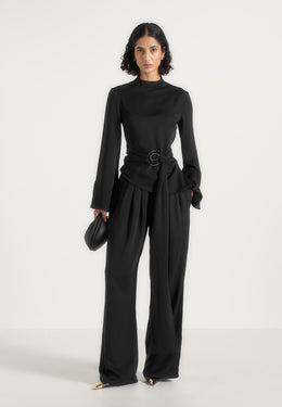 aurore-mock-neck-ring-belt-pleated-leg-jumpsuit-black