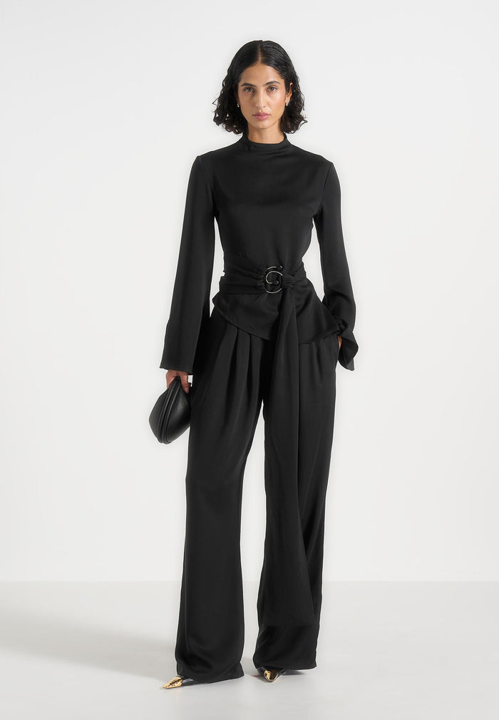 aurore-mock-neck-ring-belt-pleated-leg-jumpsuit-black
