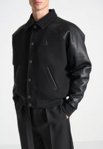 leather-raglan-varsity-jacket-black